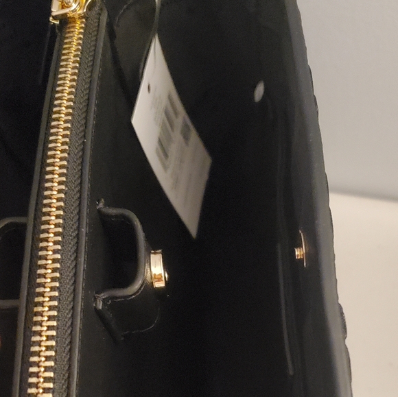 Kate Spade New York
Spade Flower Embroidered Top Handle Satchel - Picture 8 of 9